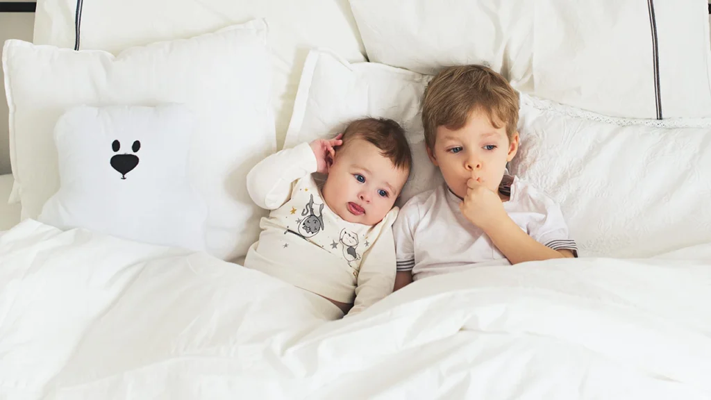 baby boys sharing bed