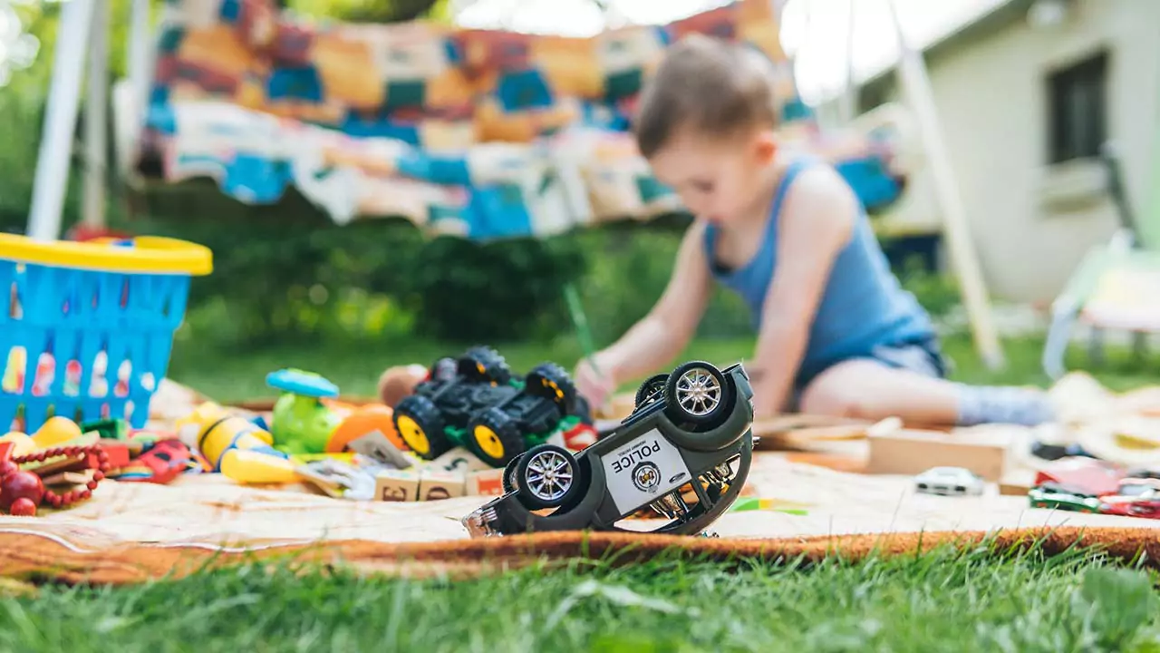 toddlers enjoy playing with cars and other toys.
